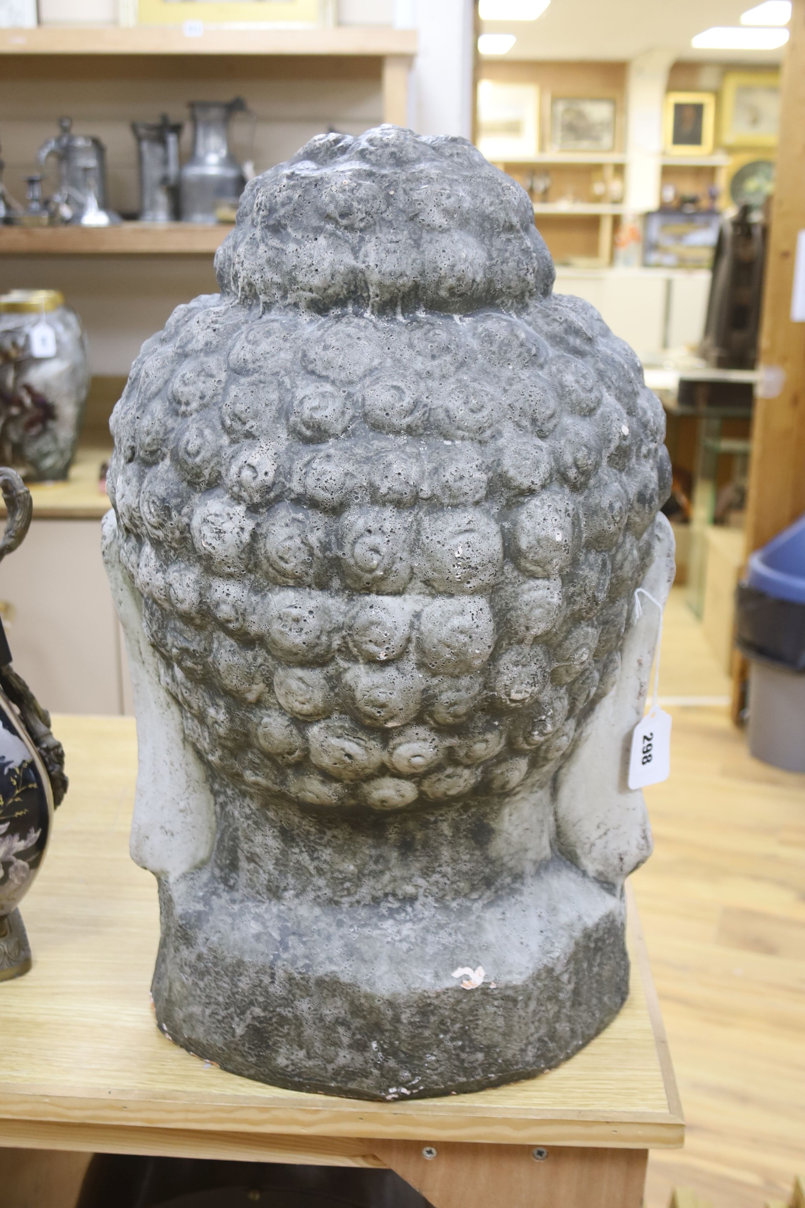 A large white painted terracotta Buddha head, height 57cm